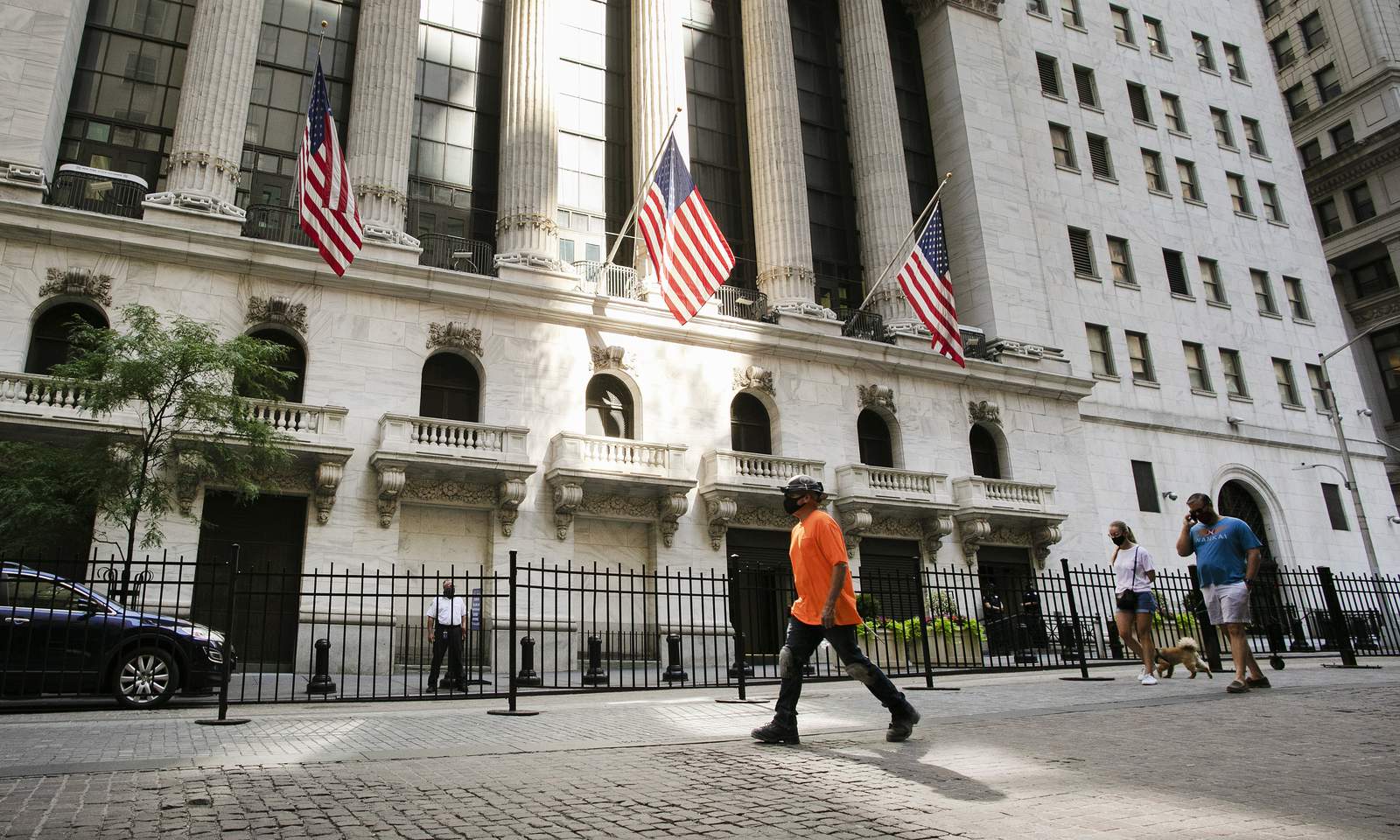 Tech losses drive Wall Street down again, ending grim week