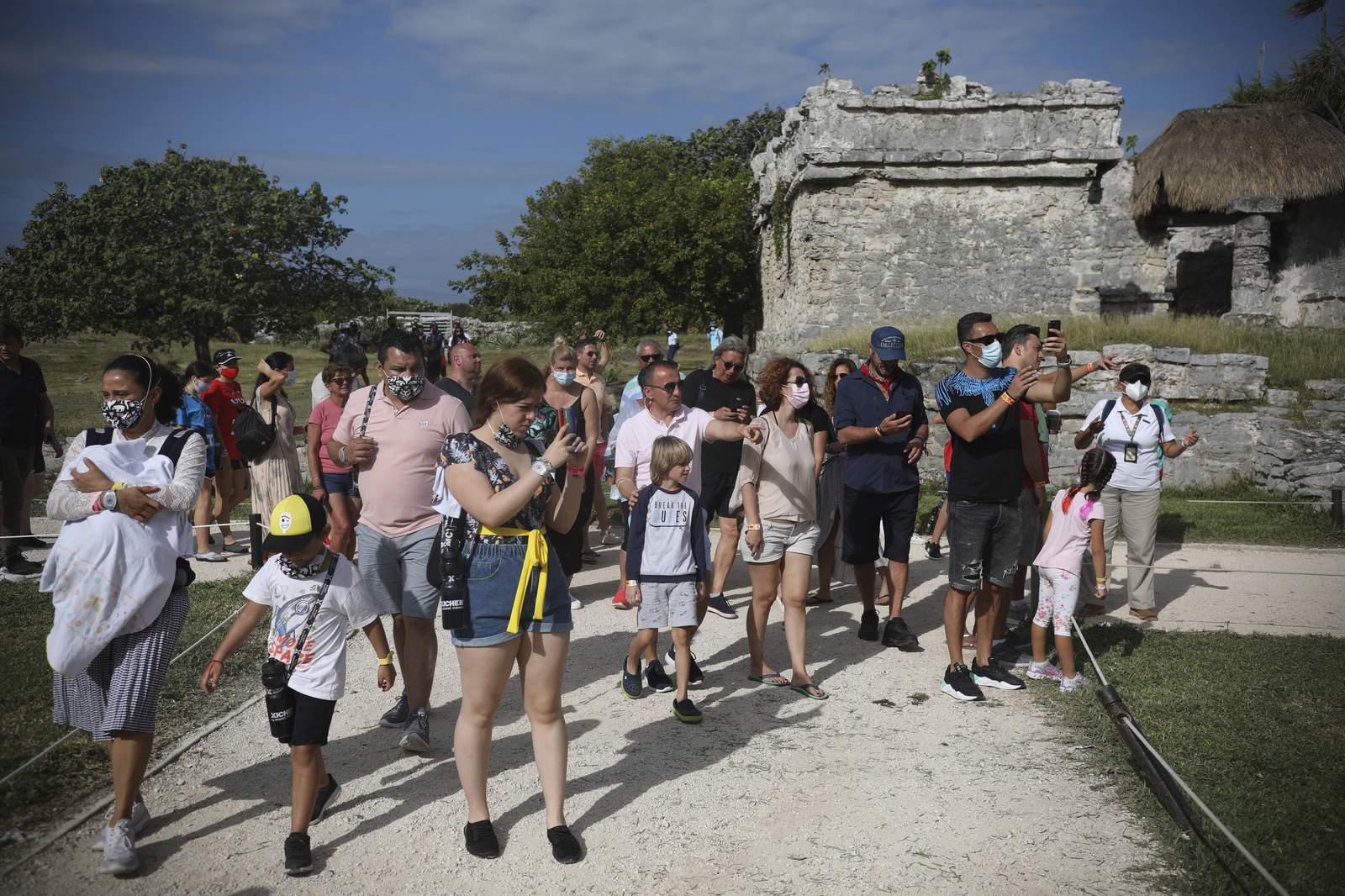Mexico complains of mask-less tourists, closes ruin site