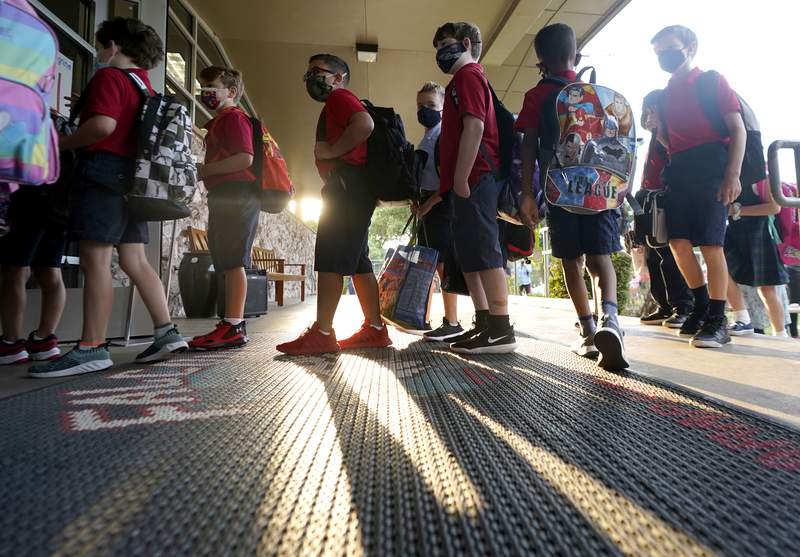 Texas school districts sued over mask mandates push back