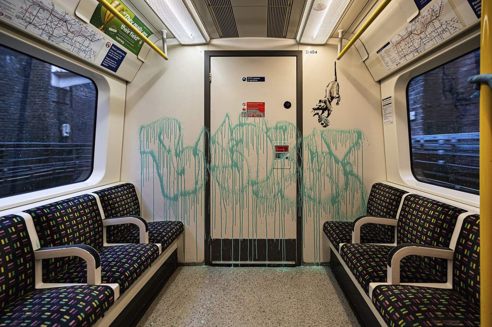 Banksy's last COVID-19 tags scrubbed from London Tube train