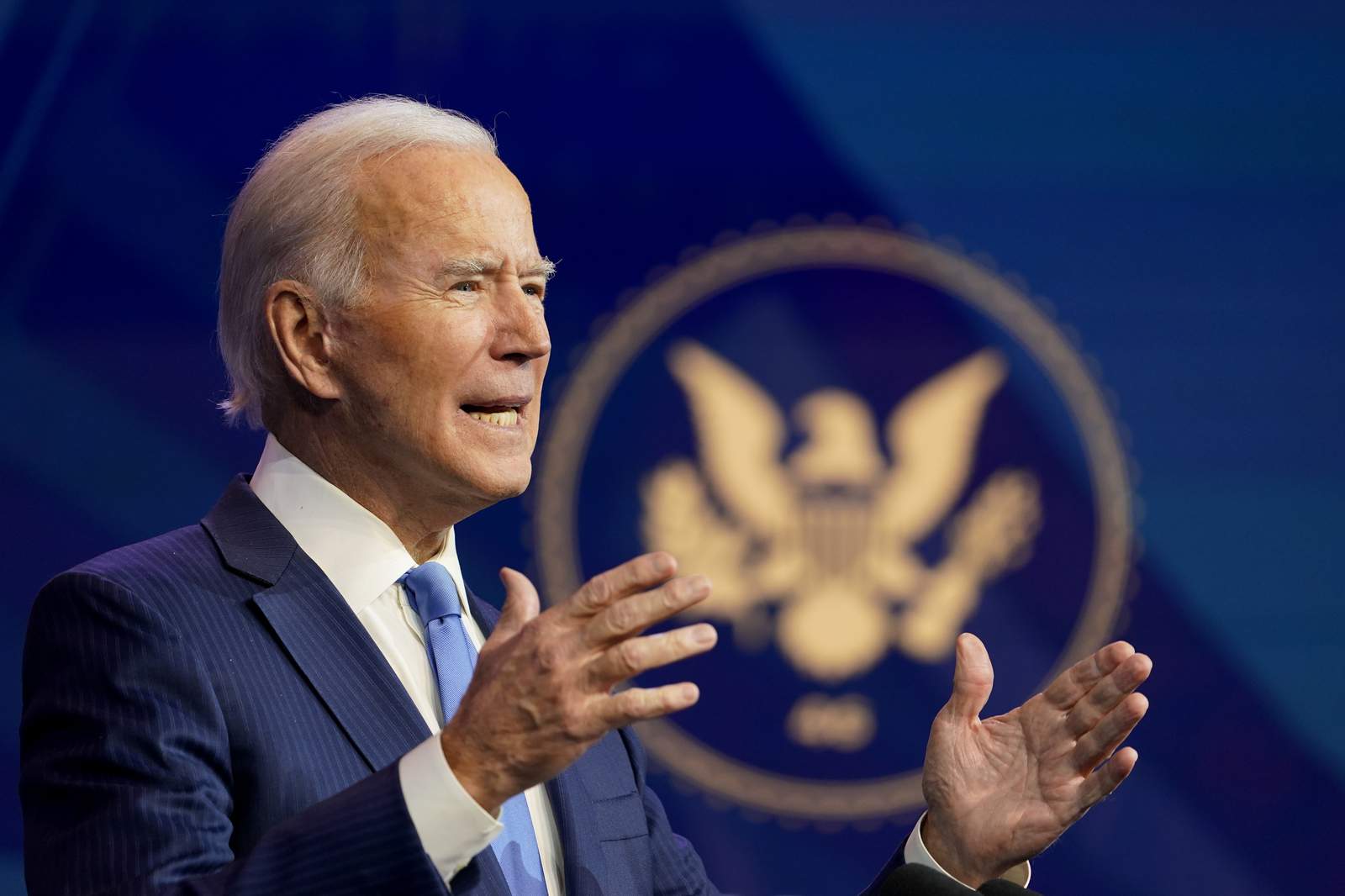 The Latest: Biden urges public to have confidence in vaccine