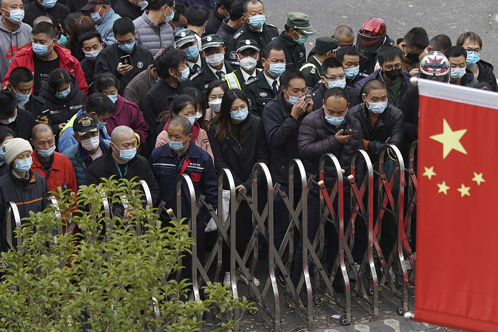 China tests millions after coronavirus flareups in 3 cities