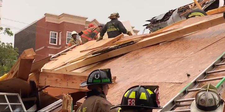 Rescuers trying to free worker trapped in DC home collapse