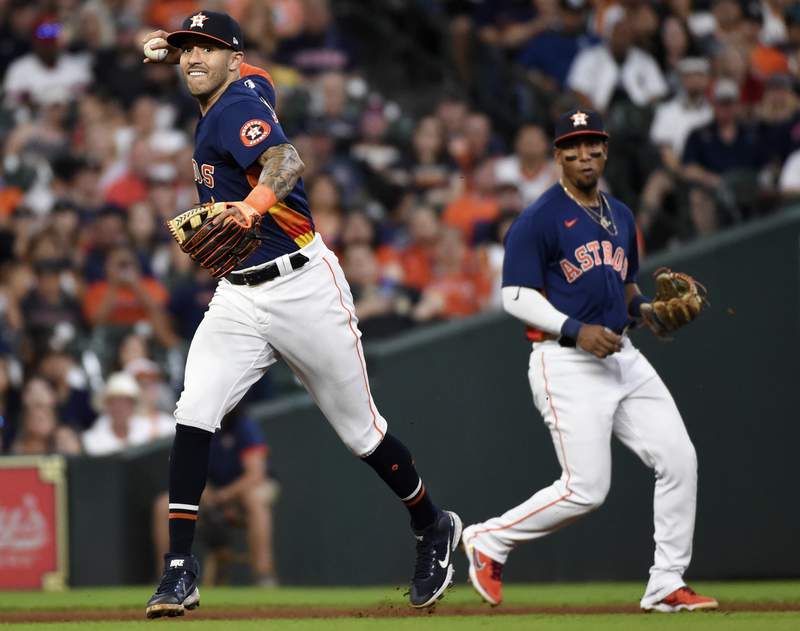 Garcia drives in 3, Correa homers as Astros beat White Sox