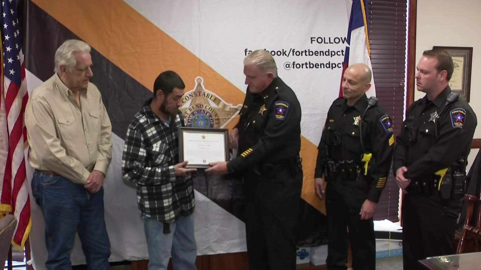 Man honored for saving driver from burning car who is now charged with crime