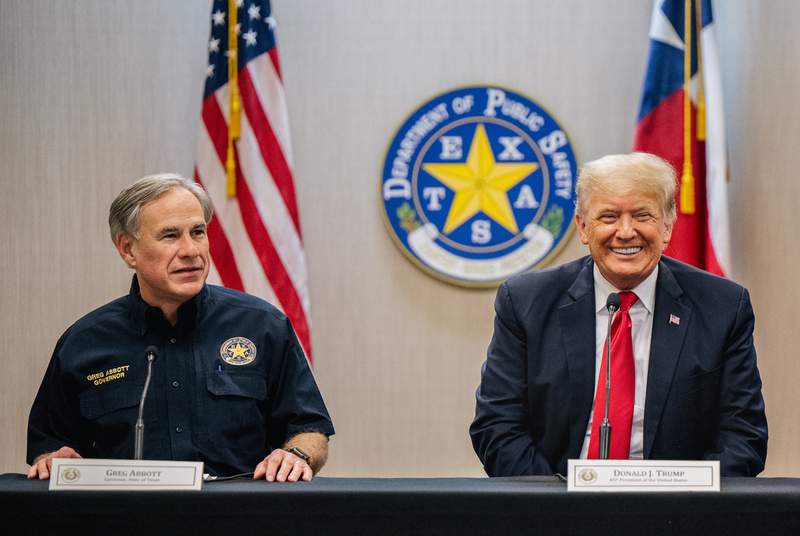 Gov. Greg Abbott, left, addresses former President Donald Trump during a border security briefing to discuss further plans in securing the southern border wall on June 30, 2021, in Weslaco.