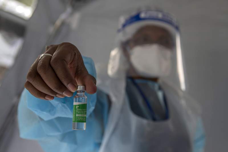 The Latest: El Salvador to donate vaccine to Honduran towns