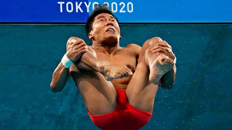 Chinese men top qualifiers for 10m platform diving final, Jordan Windle makes history for U.S.