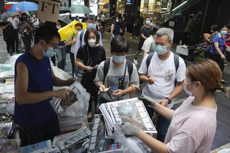 Hong Kong's last pro-democracy paper sells out final edition