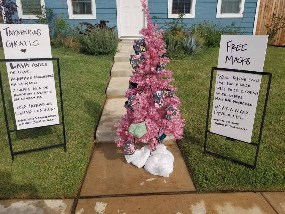 Texas woman decorates Christmas tree with free face masks those in her neighborhood can use