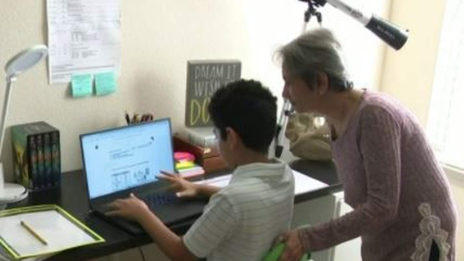 Family members help with virtual learning during pandemic