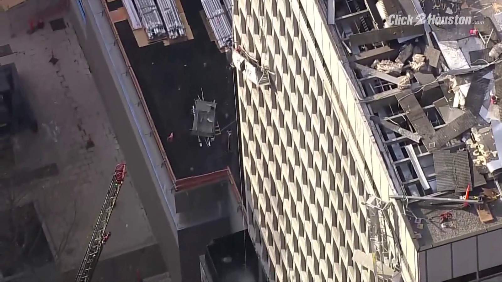 High-rise explosion in Baltimore injures 10, leaves 2 workers trapped on dangling scaffolding