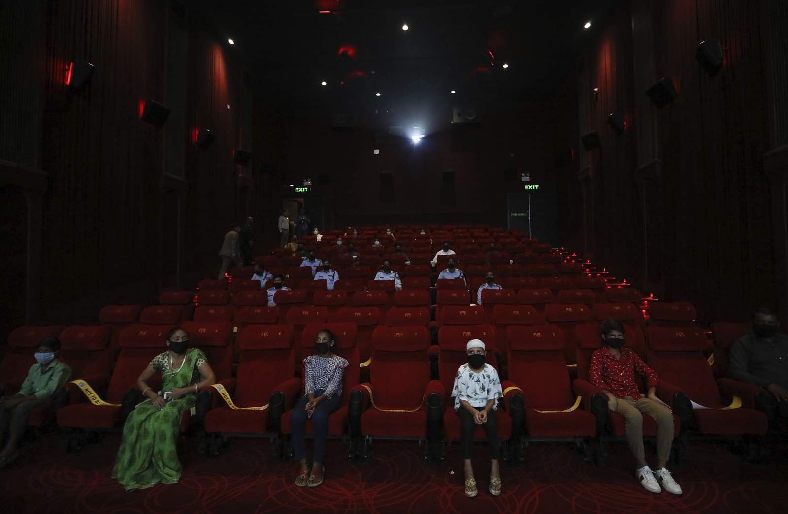 India cinemas reopen to small audiences after months in dark