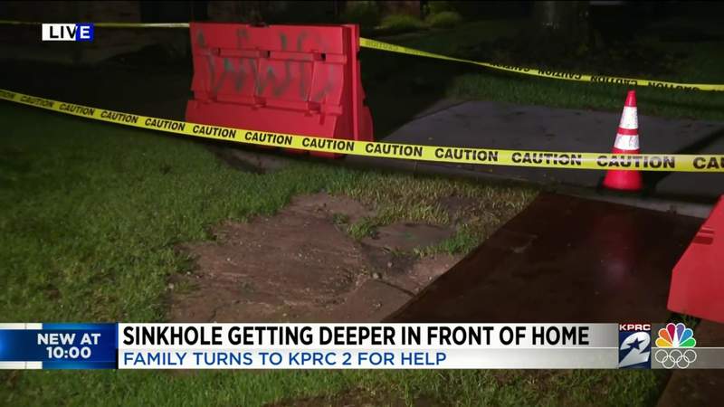 Houston family in fear dealing with growing sinkhole in front yard