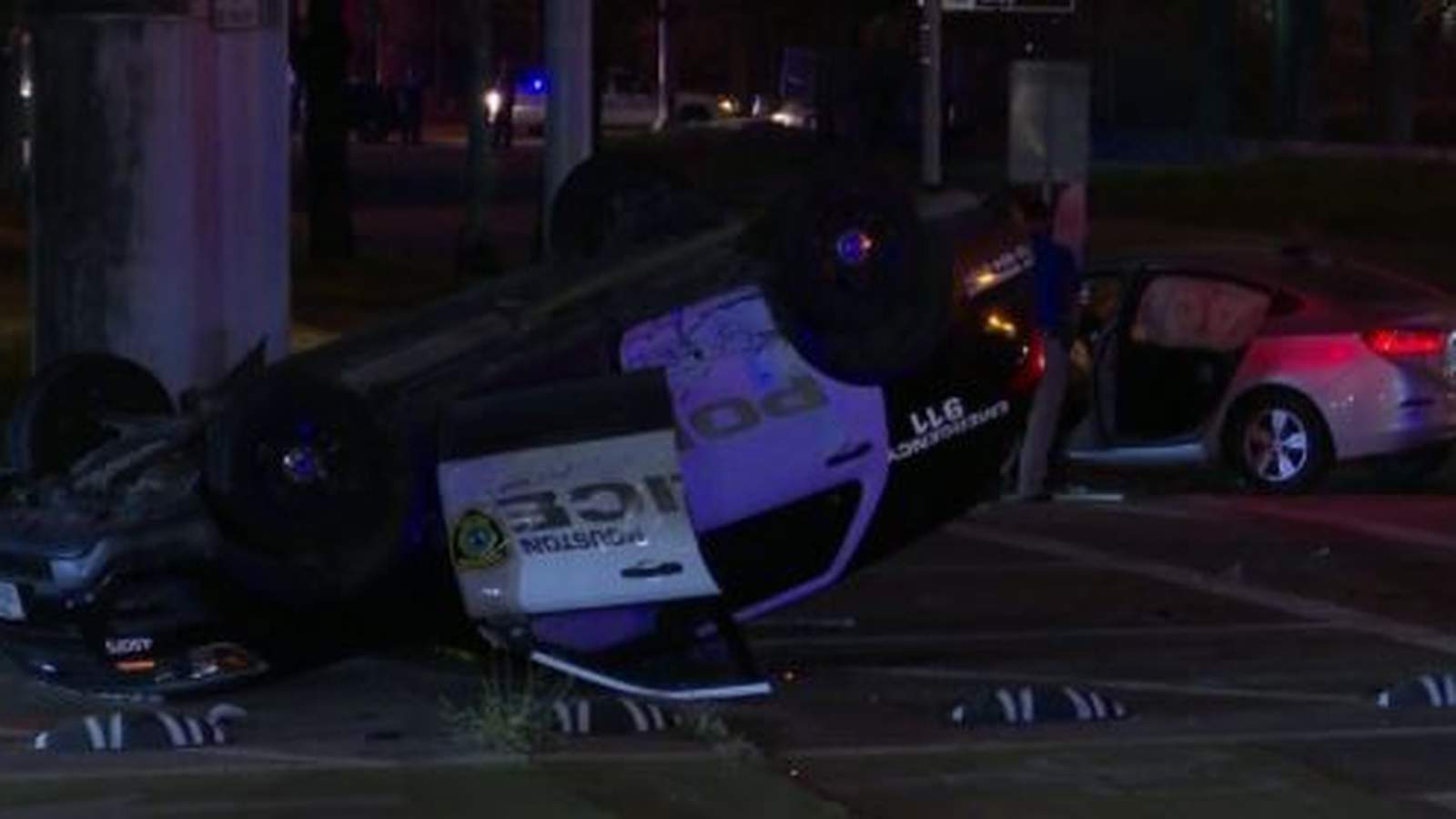 Officer’s patrol car flips after being hit by red-light runner; search for driver underway: HPD