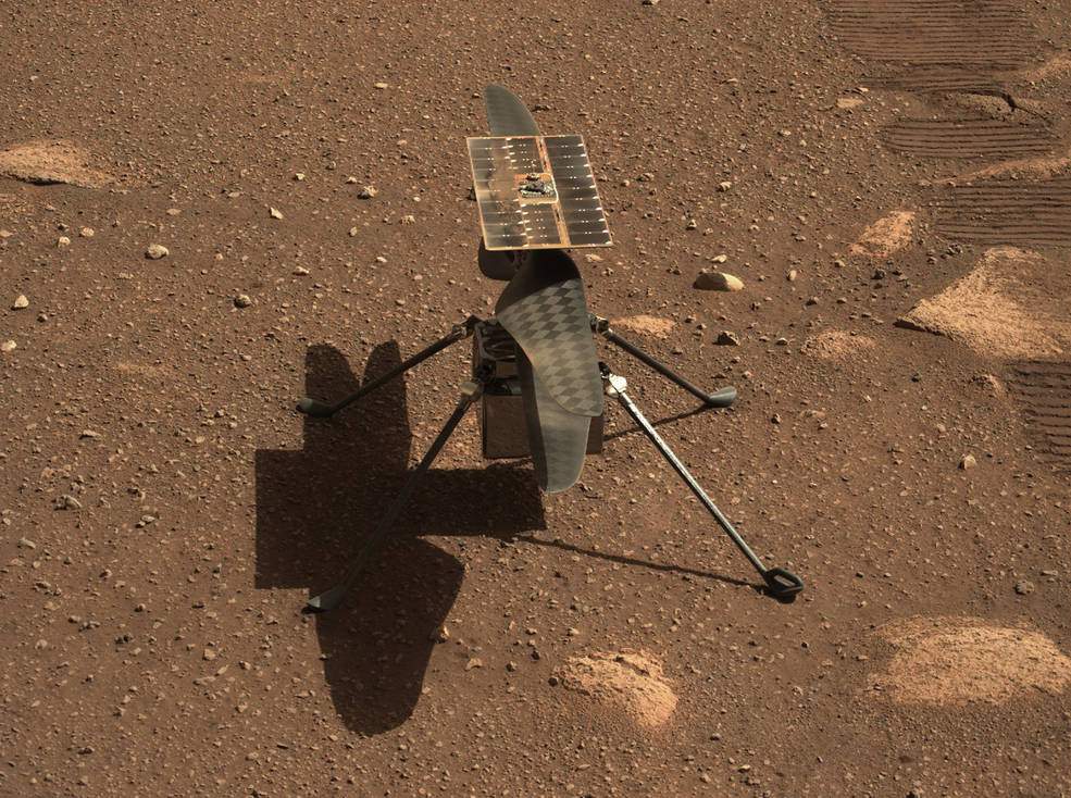 Mars helicopter snaps first color photo of Red Planet, survives first cold night
