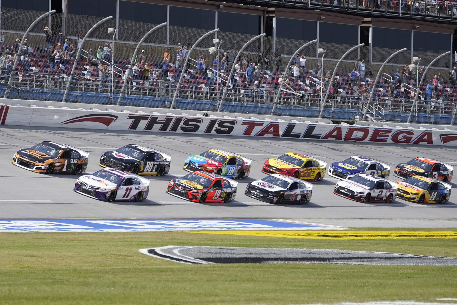 Talladega briefly stopped after 13-car crash and wall damage