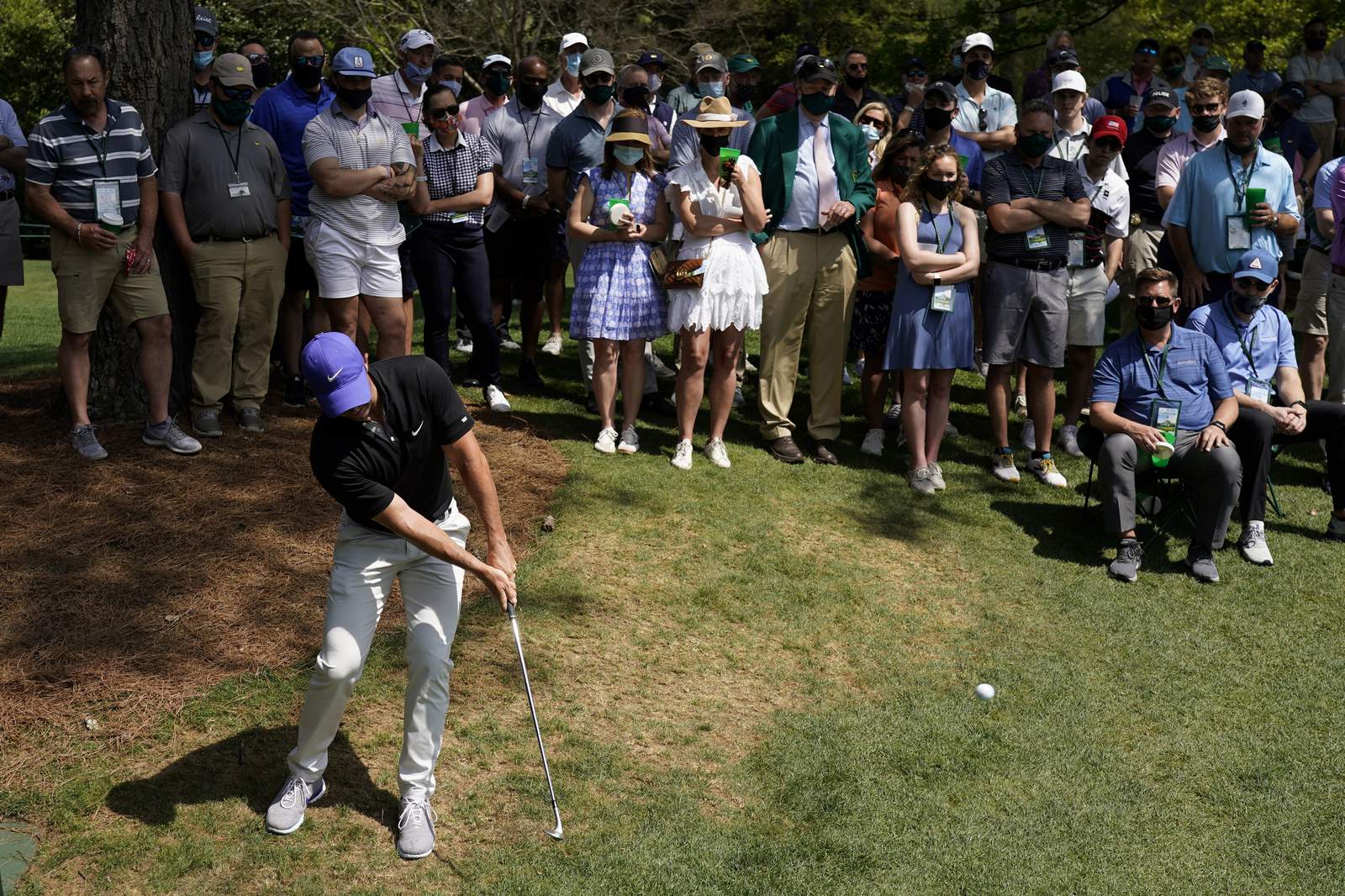 Fore, dad! McIlroy sends errant Masters shot off his father
