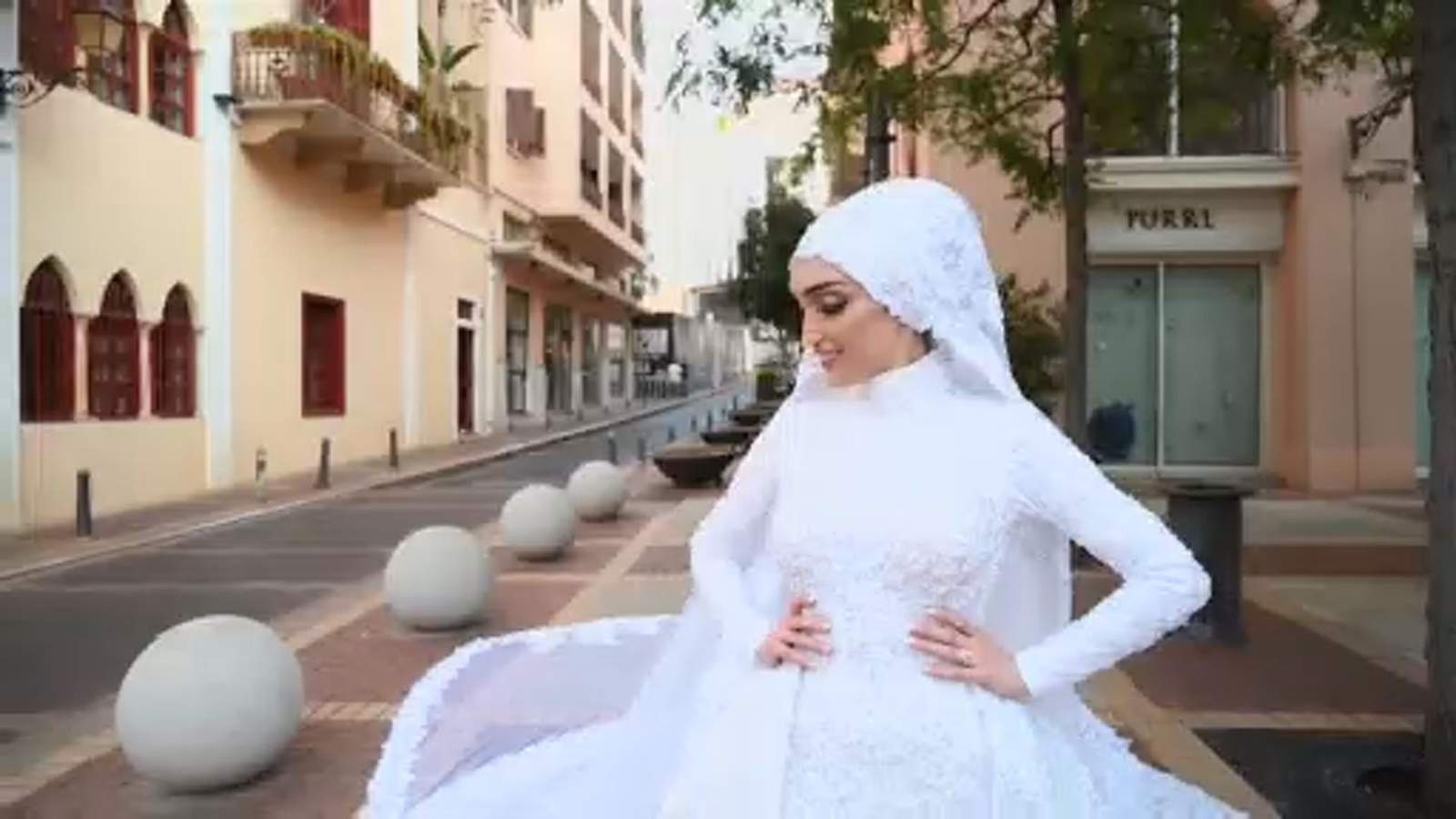 INSANE: Video shows a woman in the middle of a bridal photoshoot get knocked down in Beirut explosion