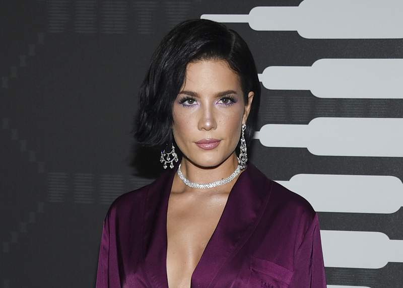 FILE - Halsey attends the Spring/Summer 2020 Savage X Fenty show in New York on Sept, 10, 2019. Halsey has something new to sing about: motherhood. The pop star announced on Instagram on Monday, July 19, 2021, that she has given birth to her first child. (Photo by Evan Agostini/Invision/AP, File)